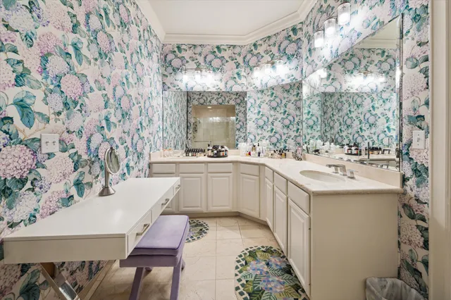 a bathroom with a sink a mirror and a toilet