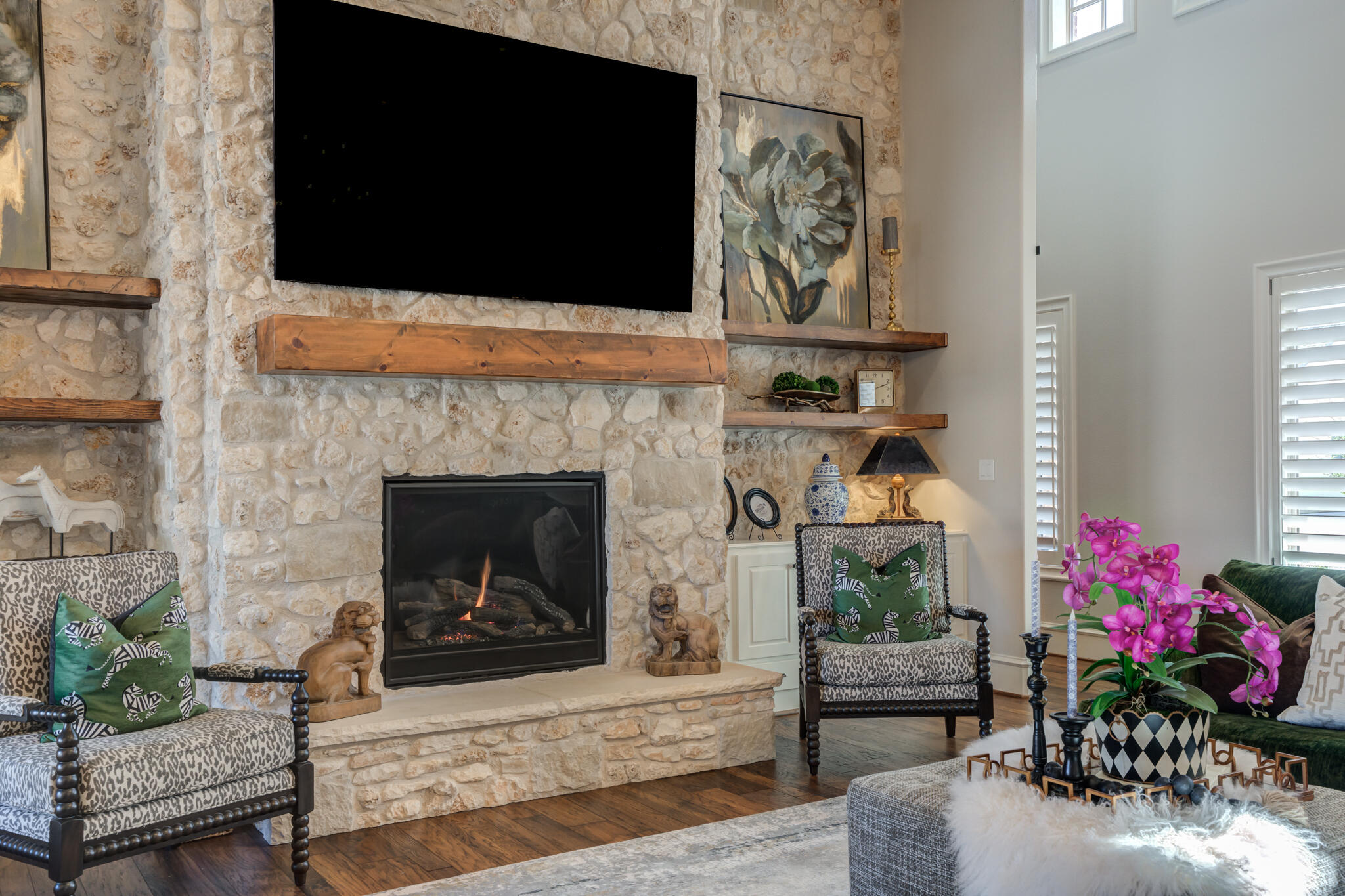 5006 117th Street Lubbock, TX 79424 - Photo 18 of 88 a living room with furniture and a fireplace