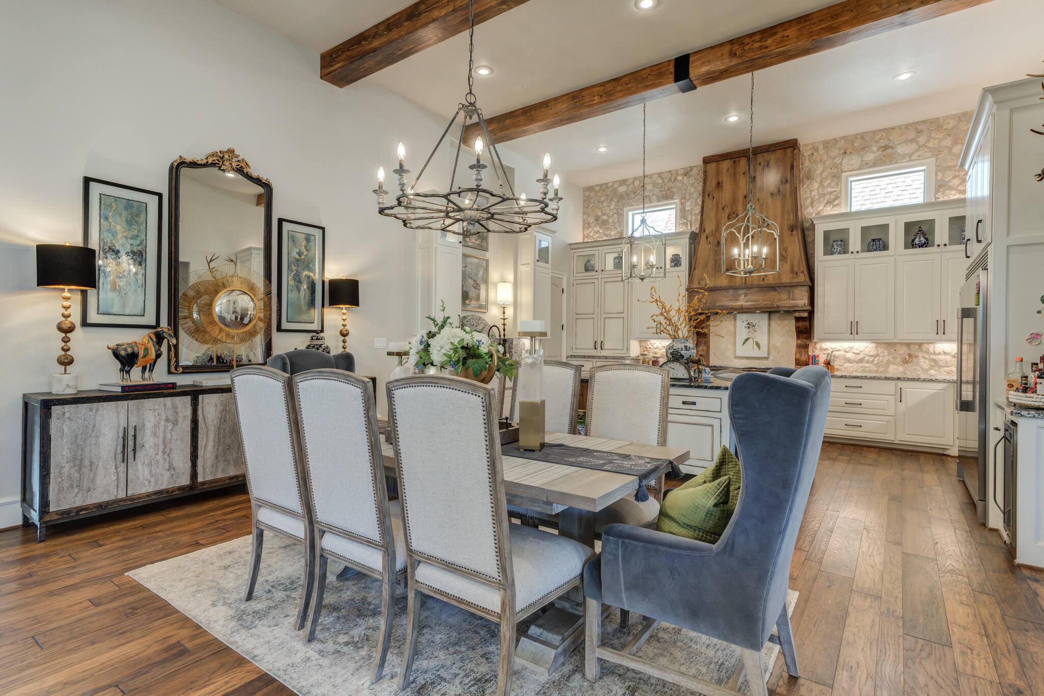 5006 117th Street Lubbock, TX 79424 - Photo 26 of 88 a view of a dining room with furniture and wooden floor