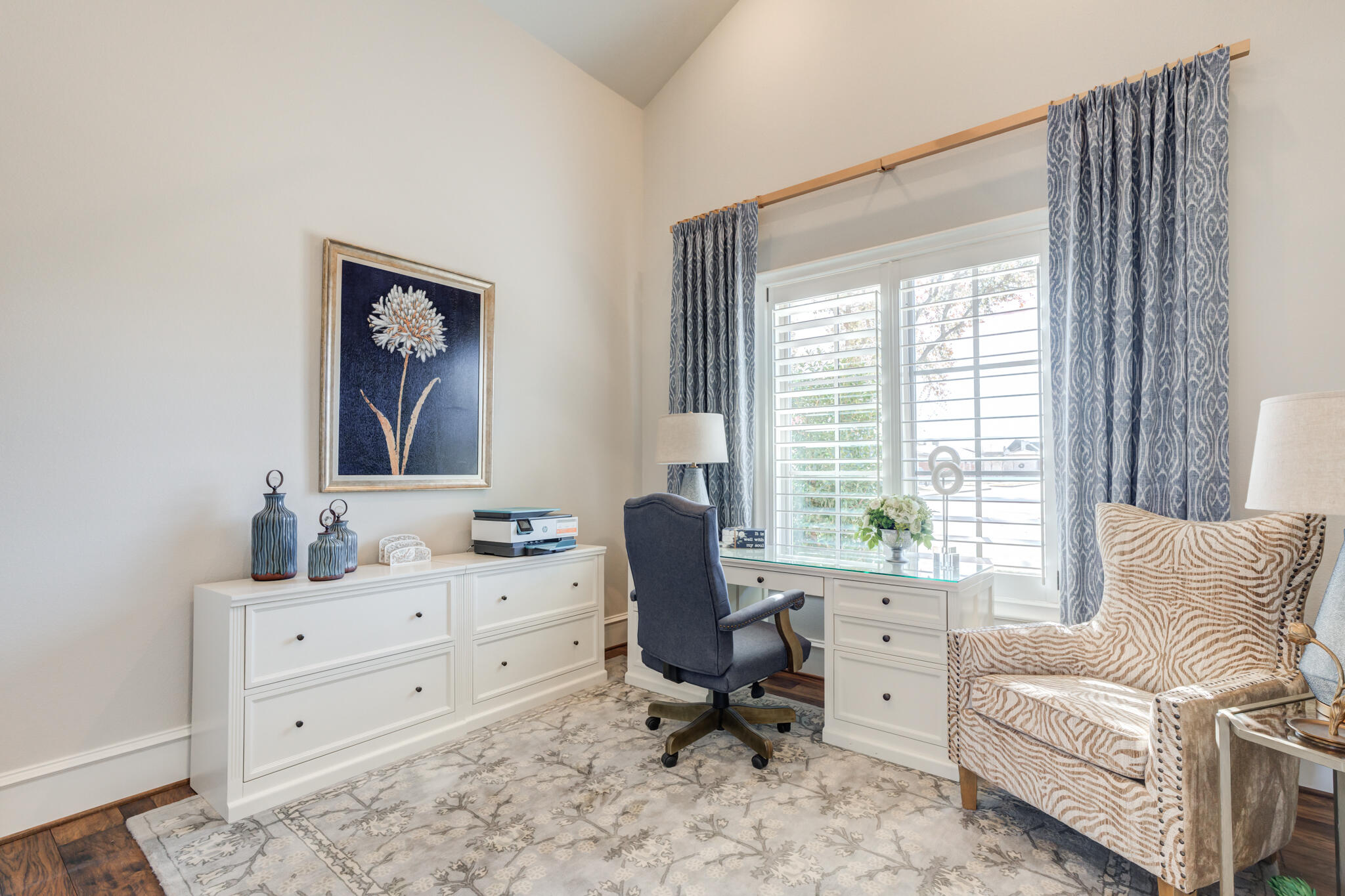 5006 117th Street Lubbock, TX 79424 - Photo 52 of 88 a view of a workspace with furniture and a window