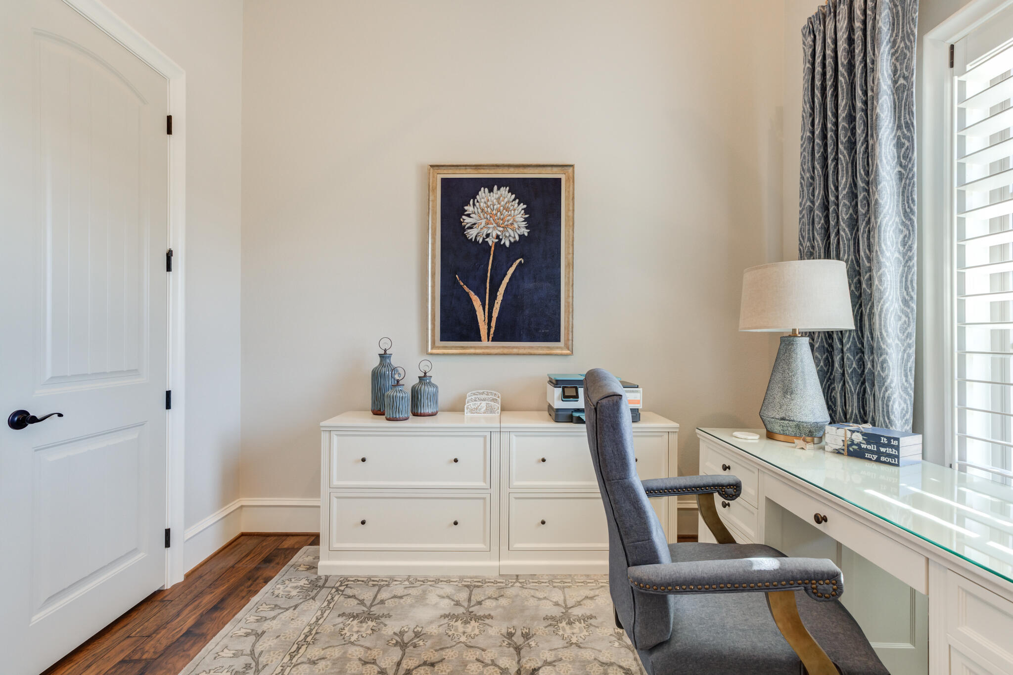 5006 117th Street Lubbock, TX 79424 - Photo 54 of 88 a view of a workspace with furniture and a window