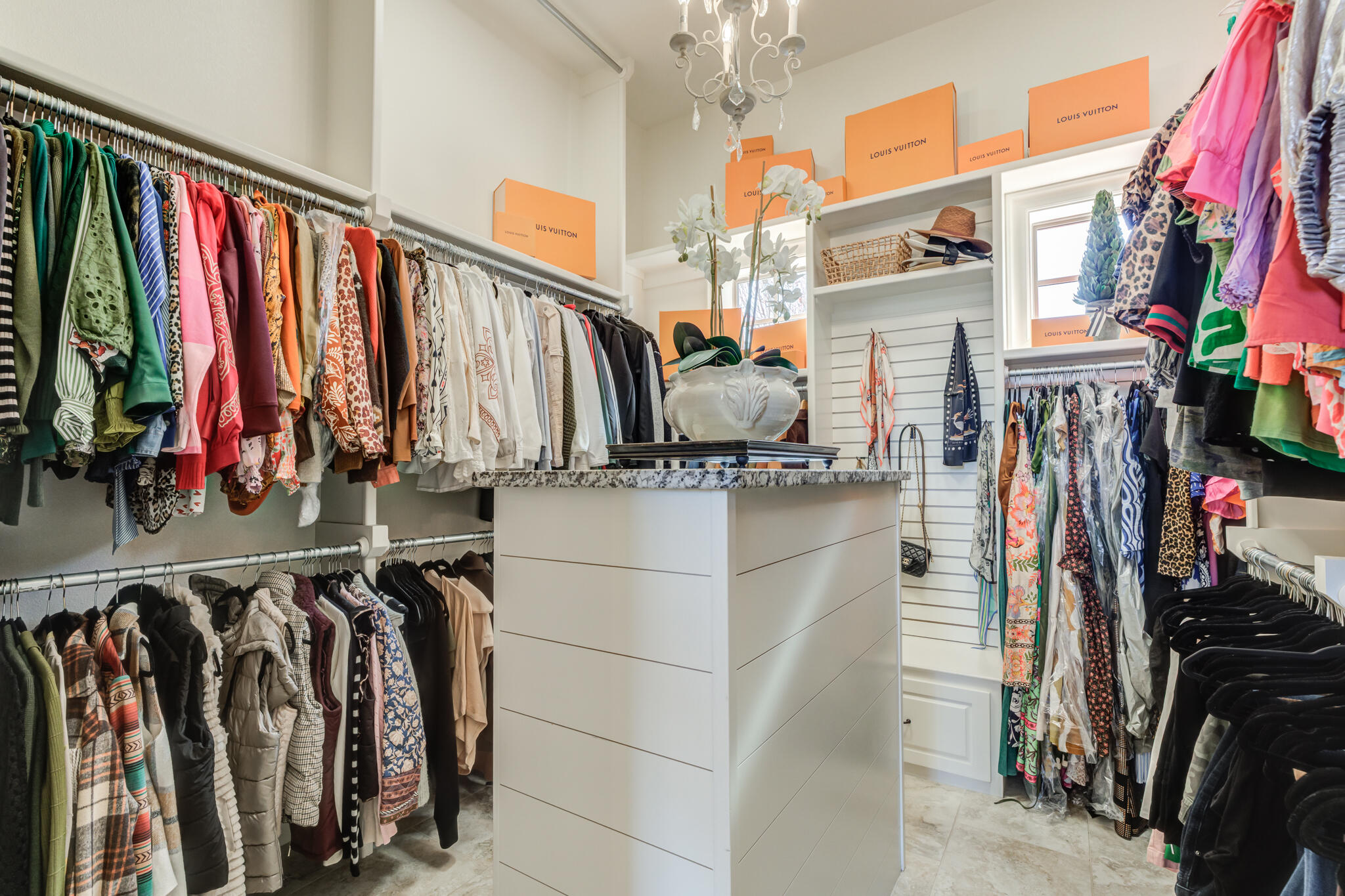 5006 117th Street Lubbock, TX 79424 - Photo 65 of 88 a view of walk in closet with clothes and shoes