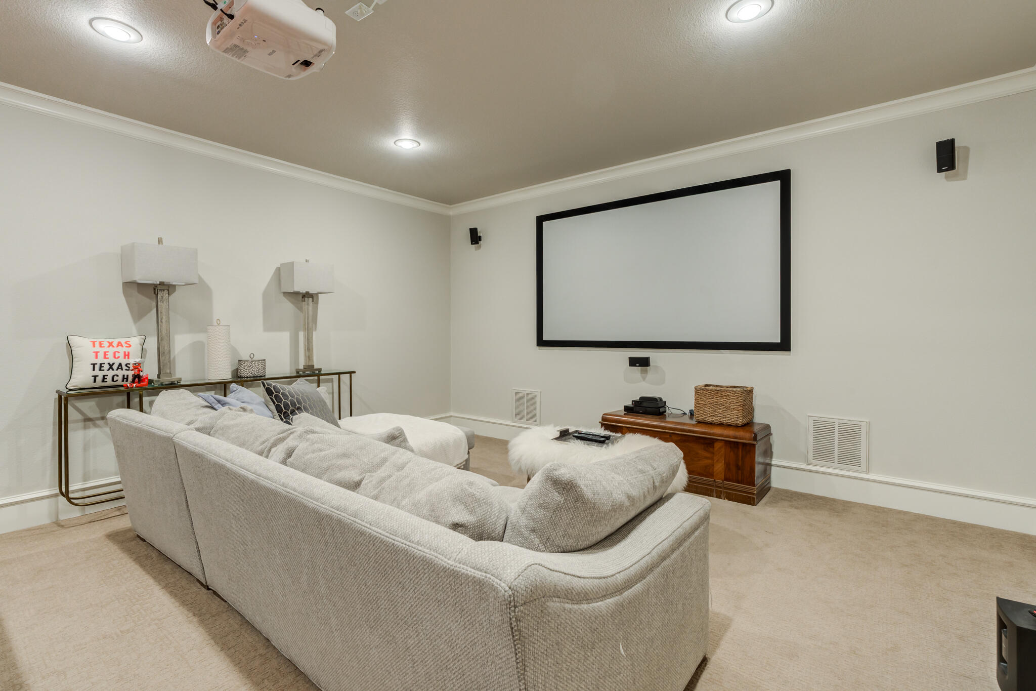 5006 117th Street Lubbock, TX 79424 - Photo 69 of 88 a living room with furniture and a flat screen tv
