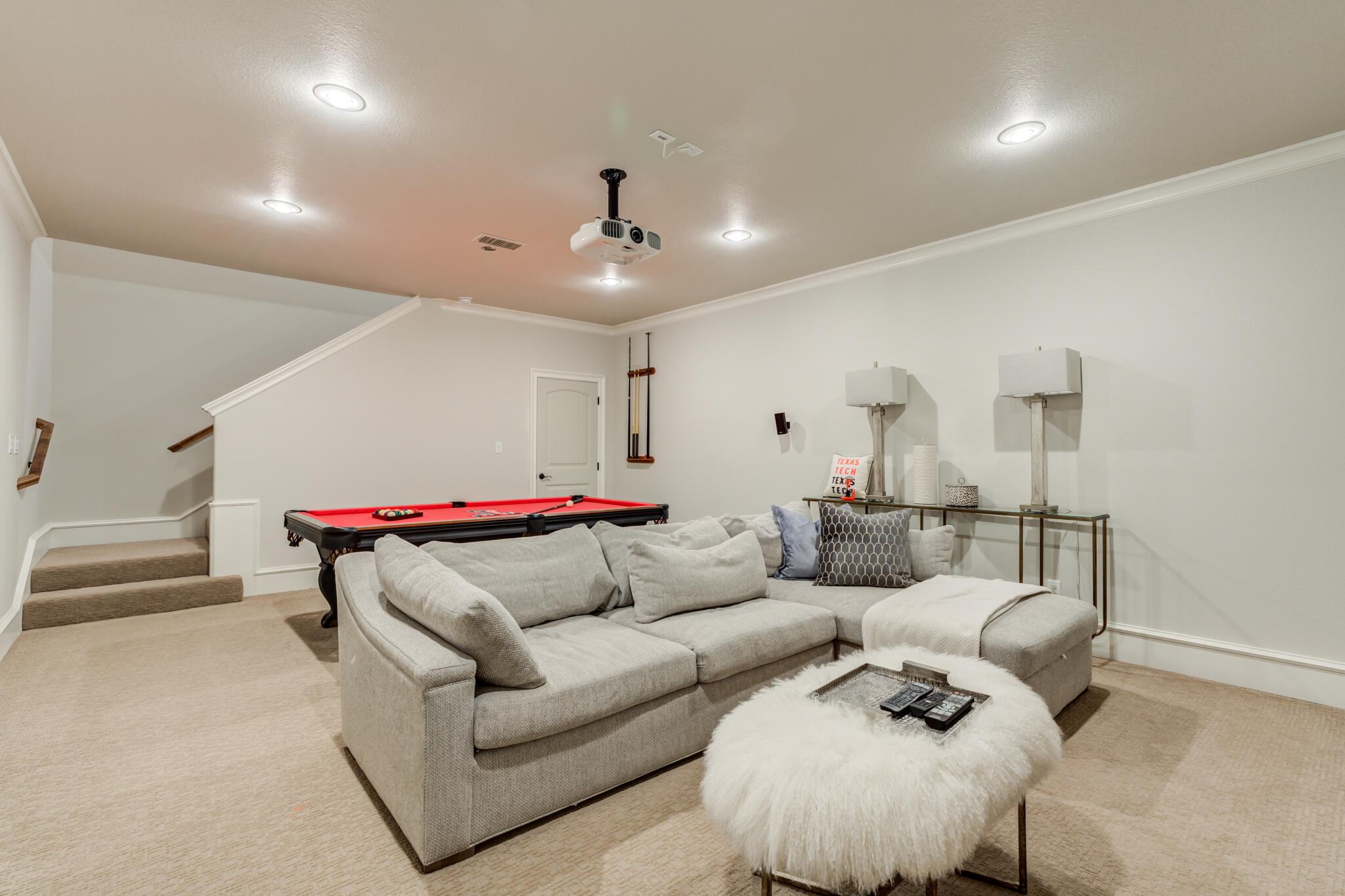 5006 117th Street Lubbock, TX 79424 - Photo 71 of 88 a living room with furniture and a ceiling fan