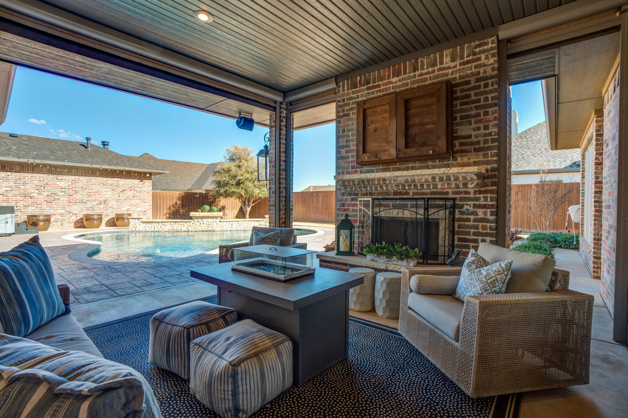 5006 117th Street Lubbock, TX 79424 - Photo 75 of 88 a living room with furniture fireplace and a large window