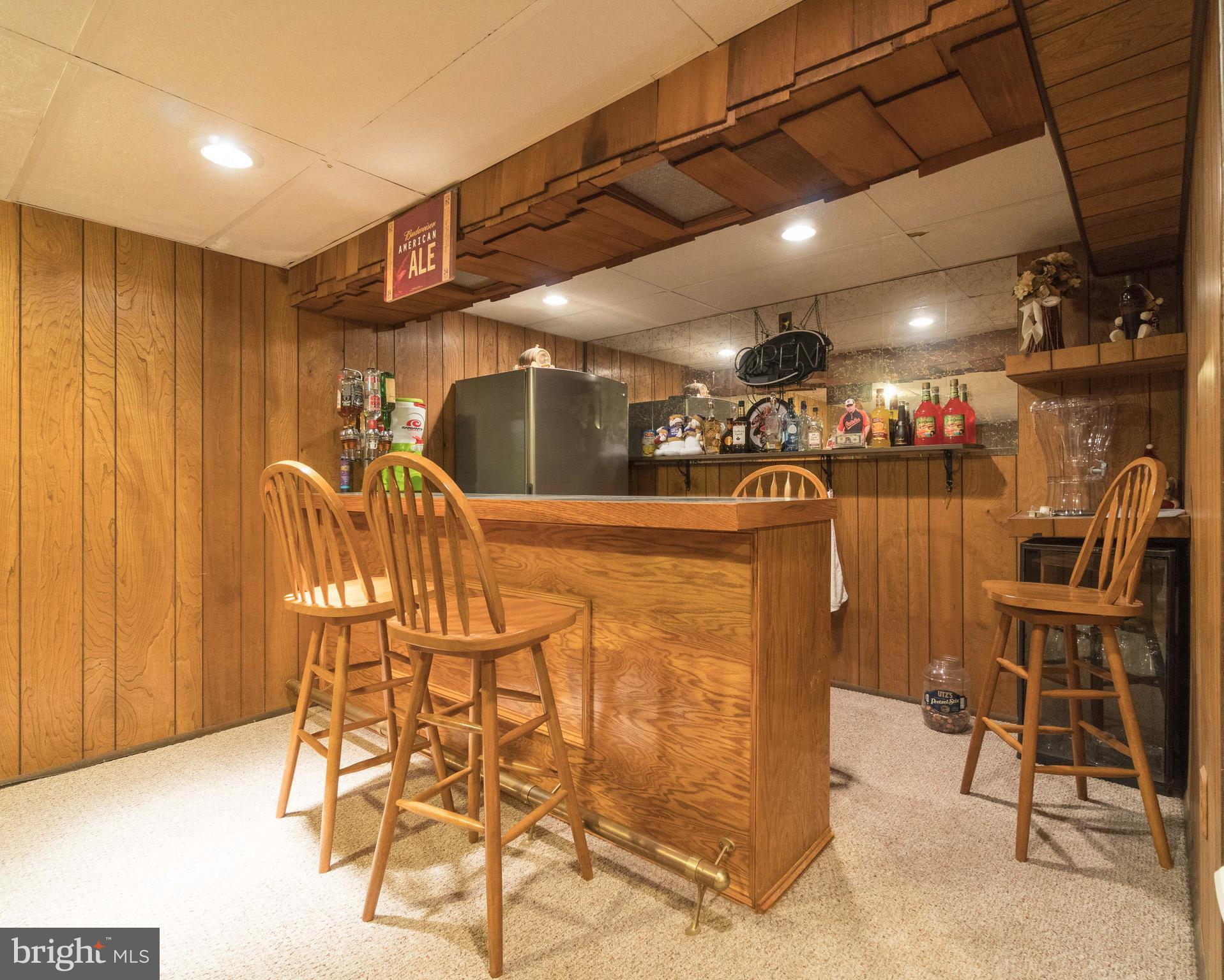 335 Holy Cross Road Baltimore, MD 21225 - Photo 17 of 23 Family Room and Bar Area