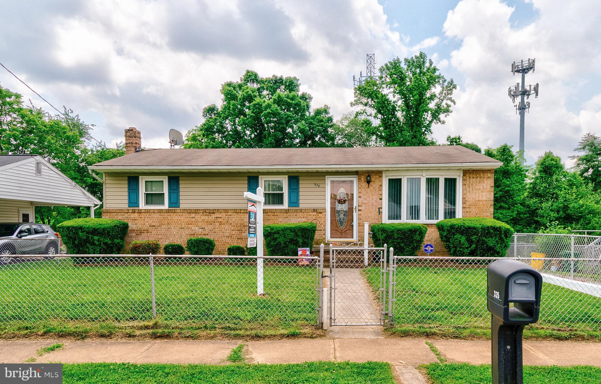 335 Holy Cross Road Baltimore, MD 21225 - Photo 3 of 23 Exterior (Front) Fenced