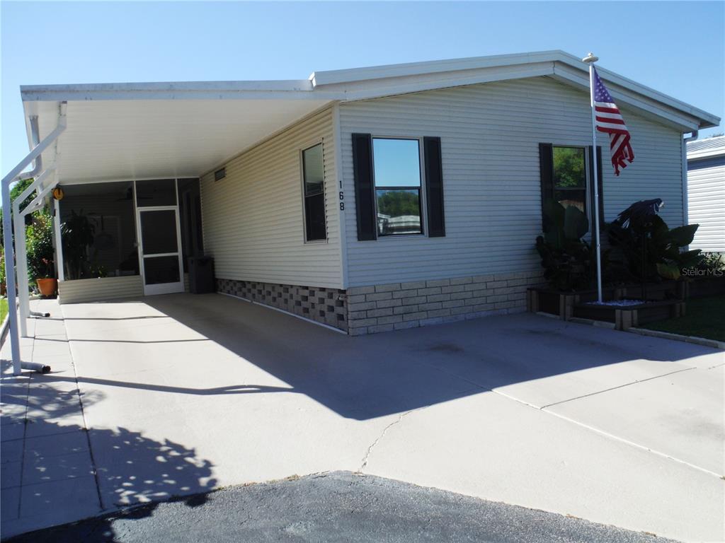 168 Pinewood Terrace, Unit 104 Safety Harbor, FL 34695 - Photo 48 of 55 a front view of a house