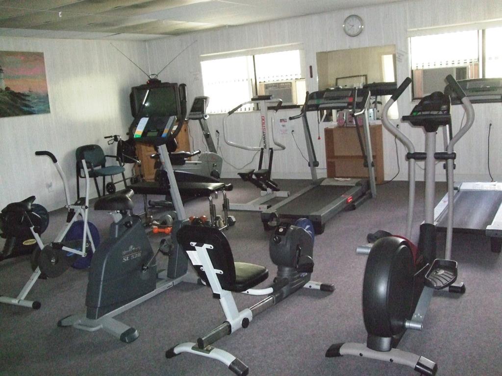 168 Pinewood Terrace, Unit 104 Safety Harbor, FL 34695 - Photo 54 of 55 a view of a room with gym equipment