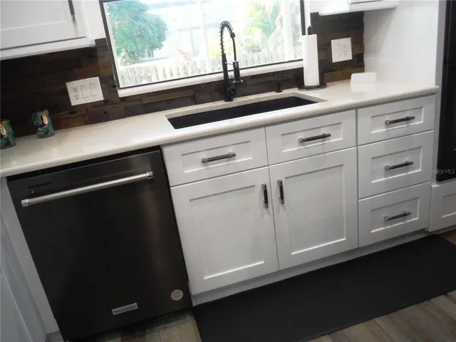 a sink with a mirror