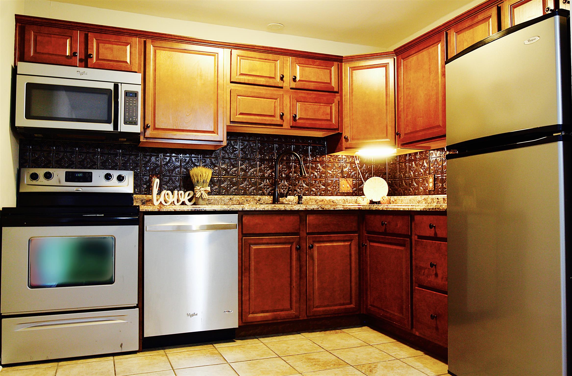 145 Hicks Road Nashville, TN 37221 - Photo 2 of 9 Kitchen features stainless appliances & tile floor