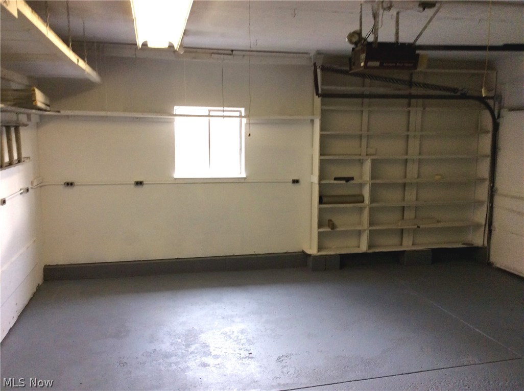 249 Spring Creek Road Northfield, OH 44067 - Photo 15 of 17 2 CAR GARAGE WITH PULLDOWN ATTIC ACCESS.
