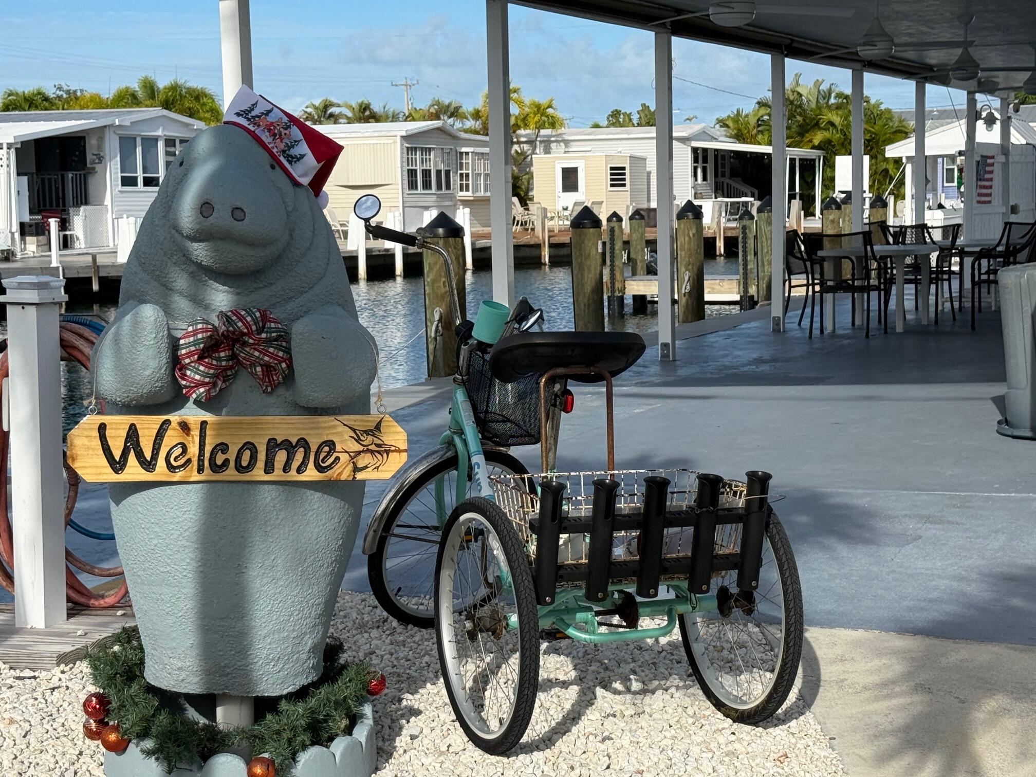 55 Boca Chica Road, Unit 57 Key West, FL 33040 - Photo 12 of 20 a view of outdoor space with seating area and outdoor seating