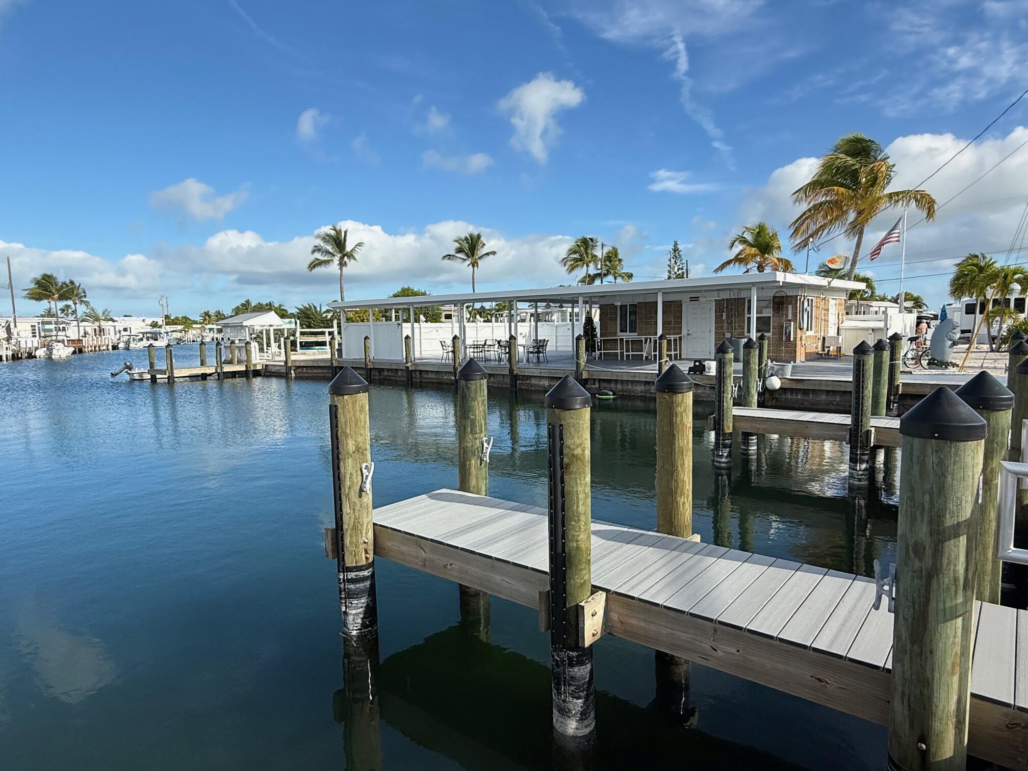 55 Boca Chica Road, Unit 57 Key West, FL 33040 - Photo 13 of 20 a view of a lake from a balcony