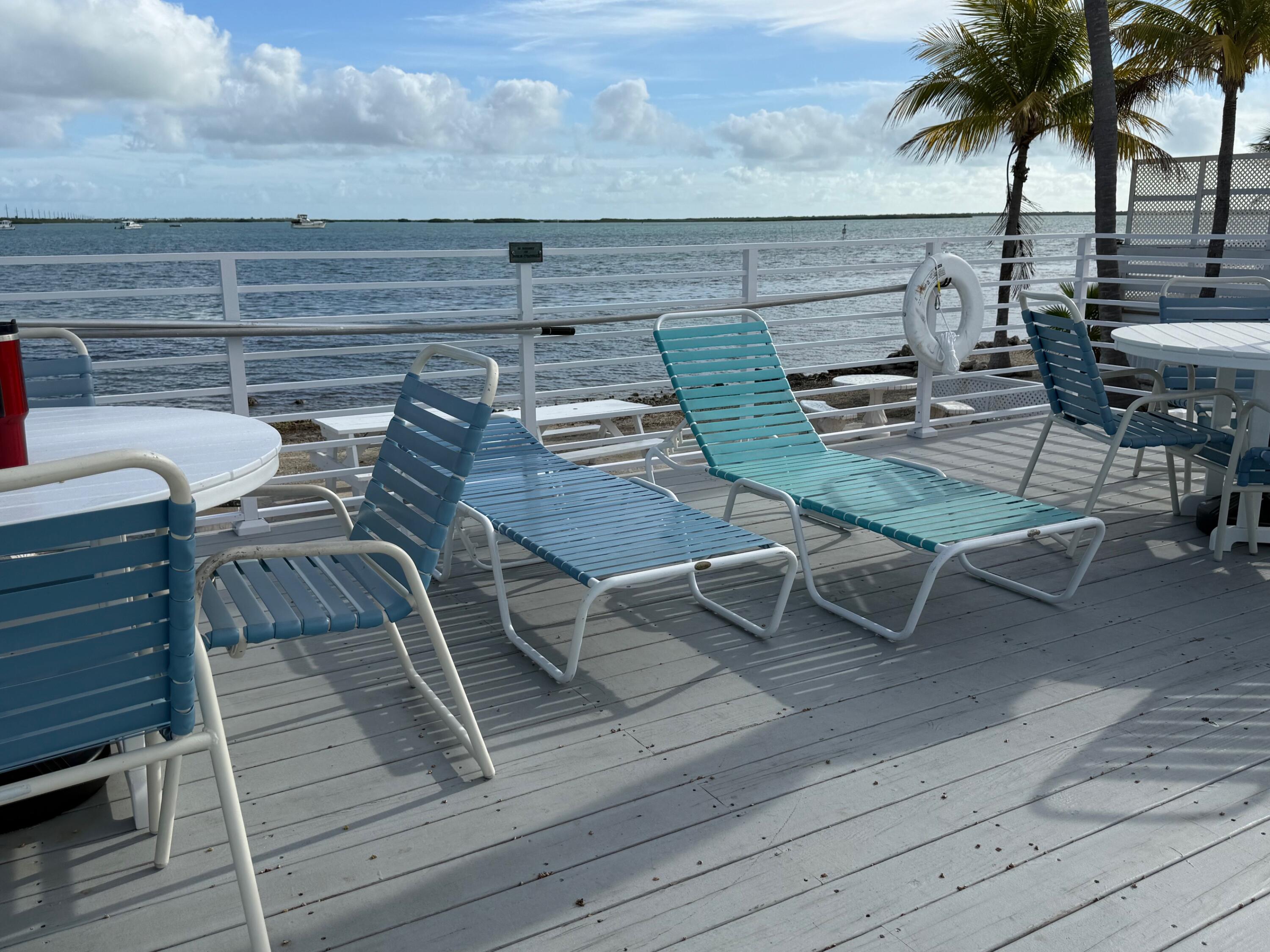 55 Boca Chica Road, Unit 57 Key West, FL 33040 - Photo 19 of 20 a view of a terrace with seating area