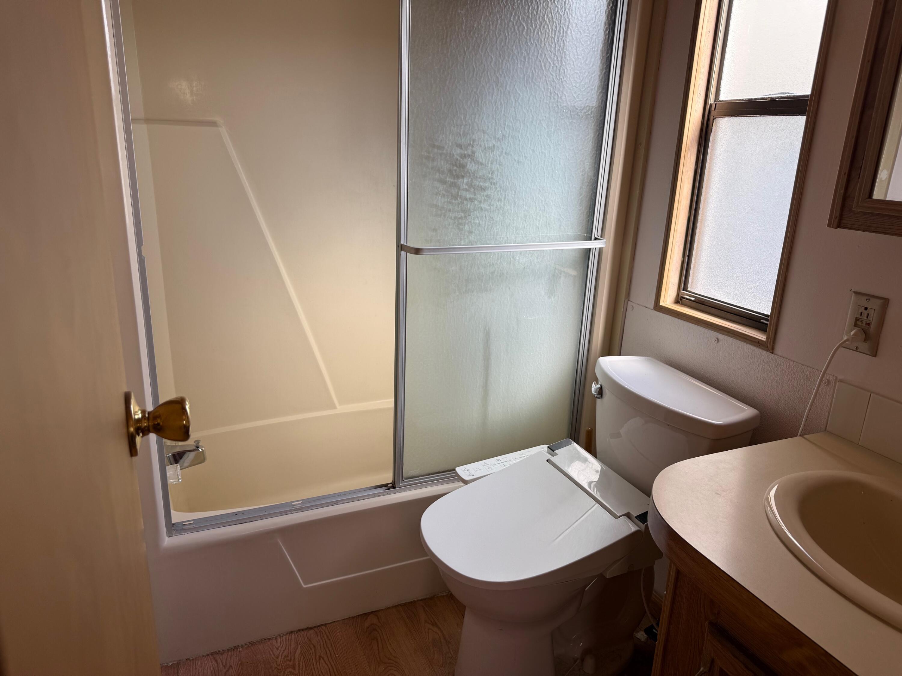55 Boca Chica Road, Unit 57 Key West, FL 33040 - Photo 6 of 20 a bathroom with a sink and a toilet