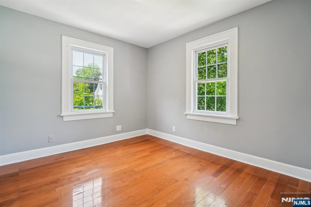 217 Grayson Place Teaneck, NJ 07666 - Photo 18 of 40 an empty room with a window