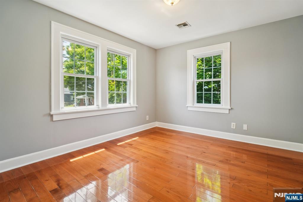 217 Grayson Place Teaneck, NJ 07666 - Photo 19 of 40 a view of an empty room with a window