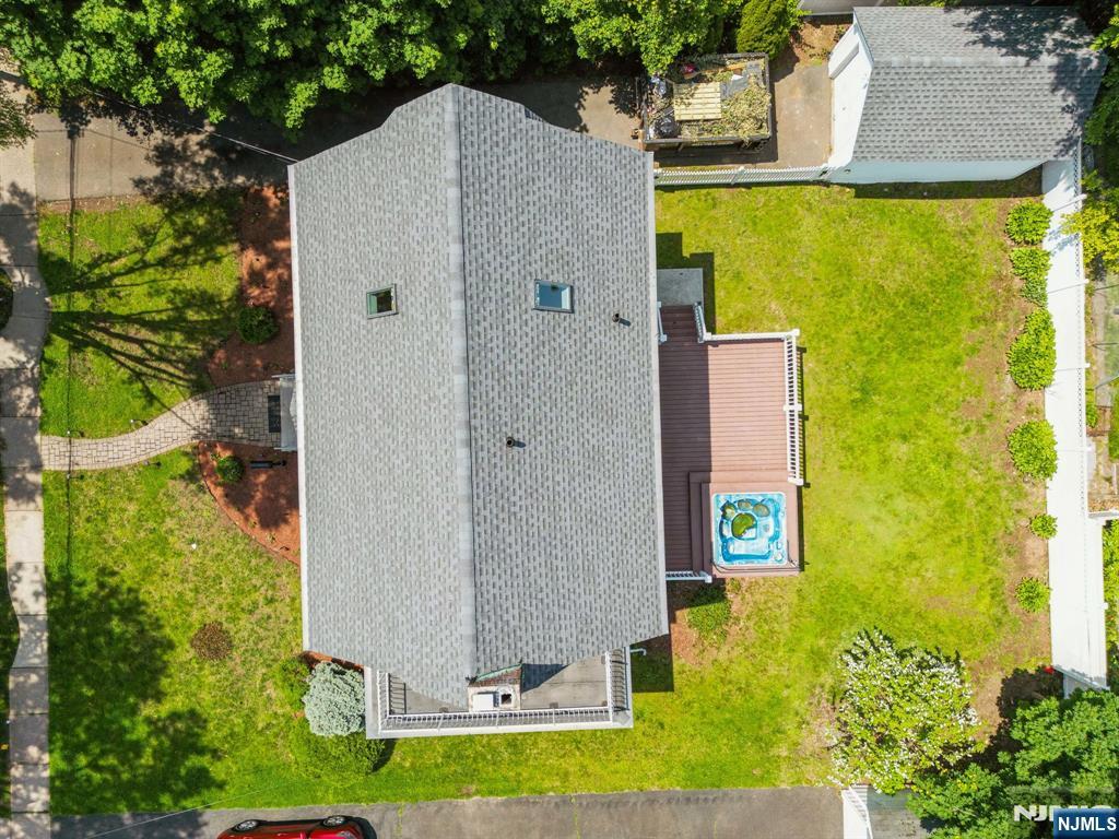 217 Grayson Place Teaneck, NJ 07666 - Photo 33 of 40 a aerial view of a house with a yard