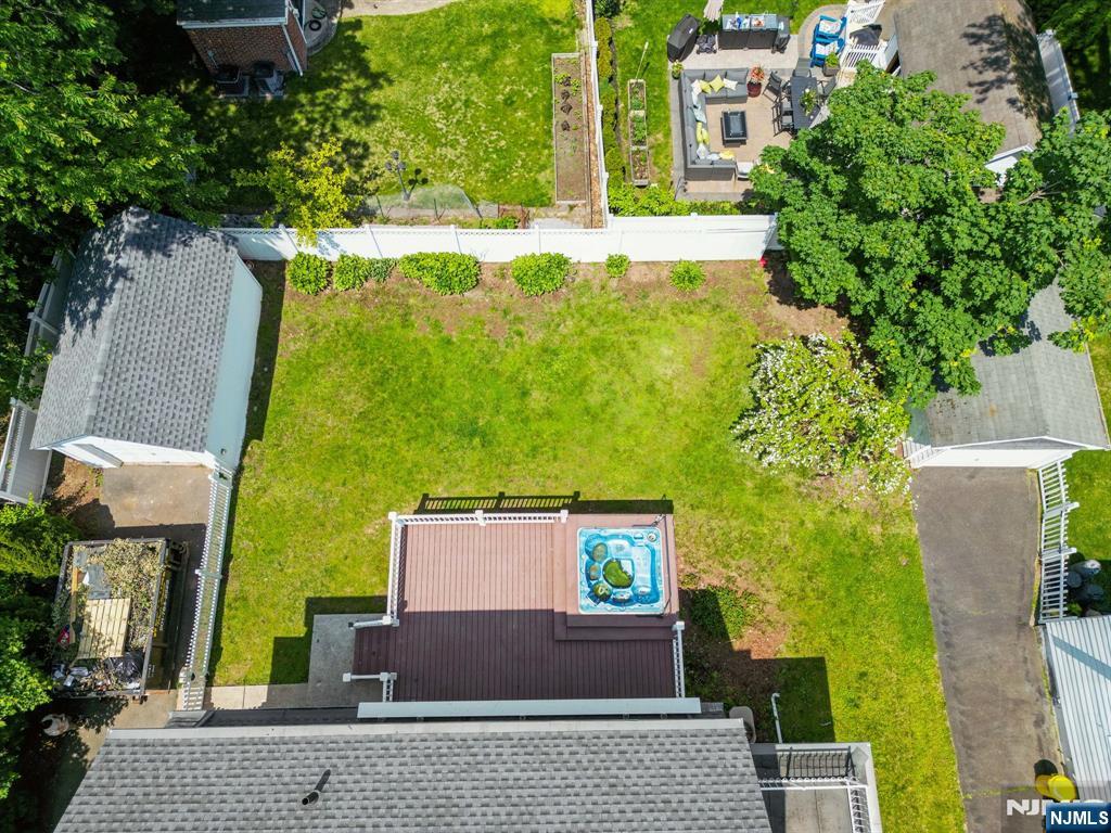 217 Grayson Place Teaneck, NJ 07666 - Photo 34 of 40 an aerial view of a house with a yard basket ball court and outdoor seating