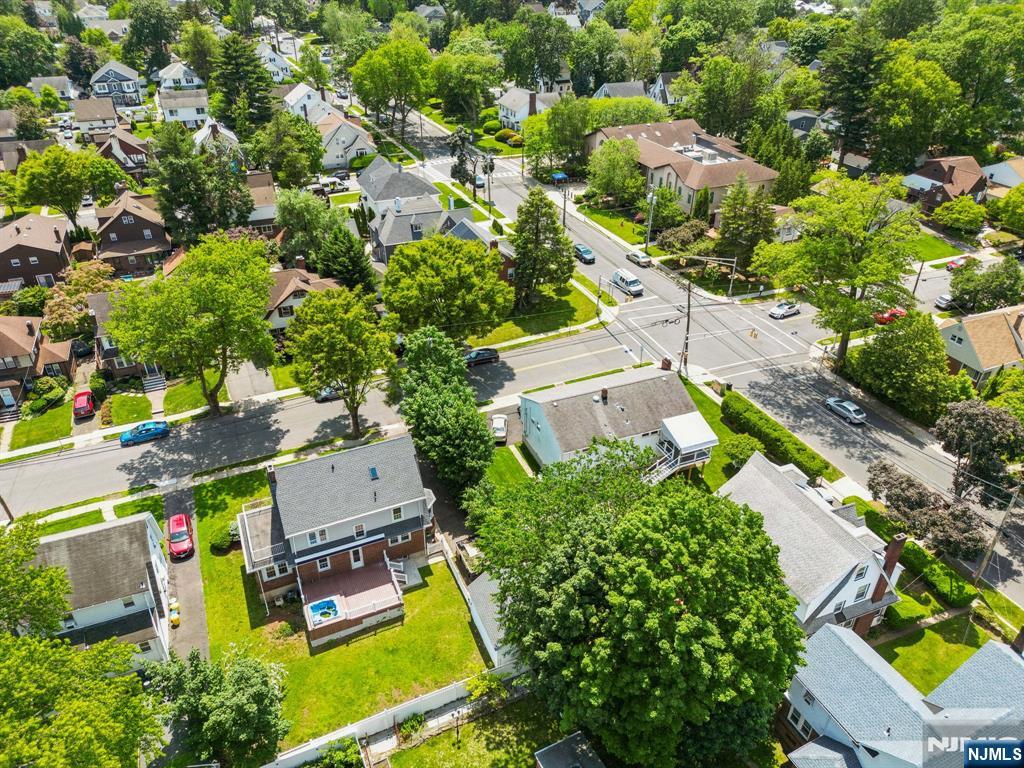 217 Grayson Place Teaneck, NJ 07666 - Photo 39 of 40 an aerial view of residential house with outdoor space and swimming pool