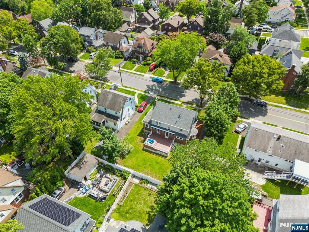 217 Grayson Place Teaneck, NJ 07666 - Photo 40 of 40 an aerial view of a house with a yard