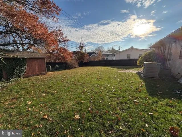 a view of a yard with an outdoor space