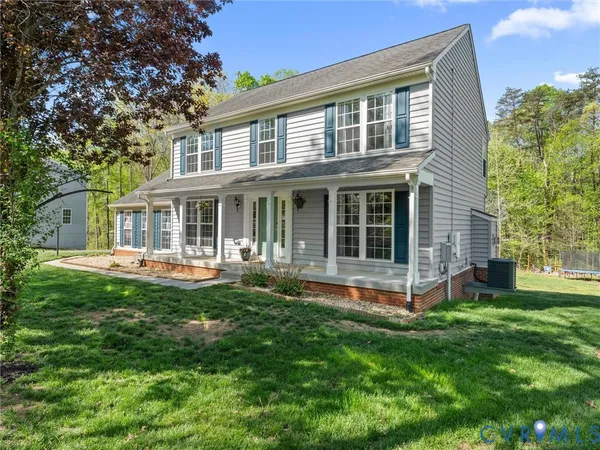 front view of a house with a yard