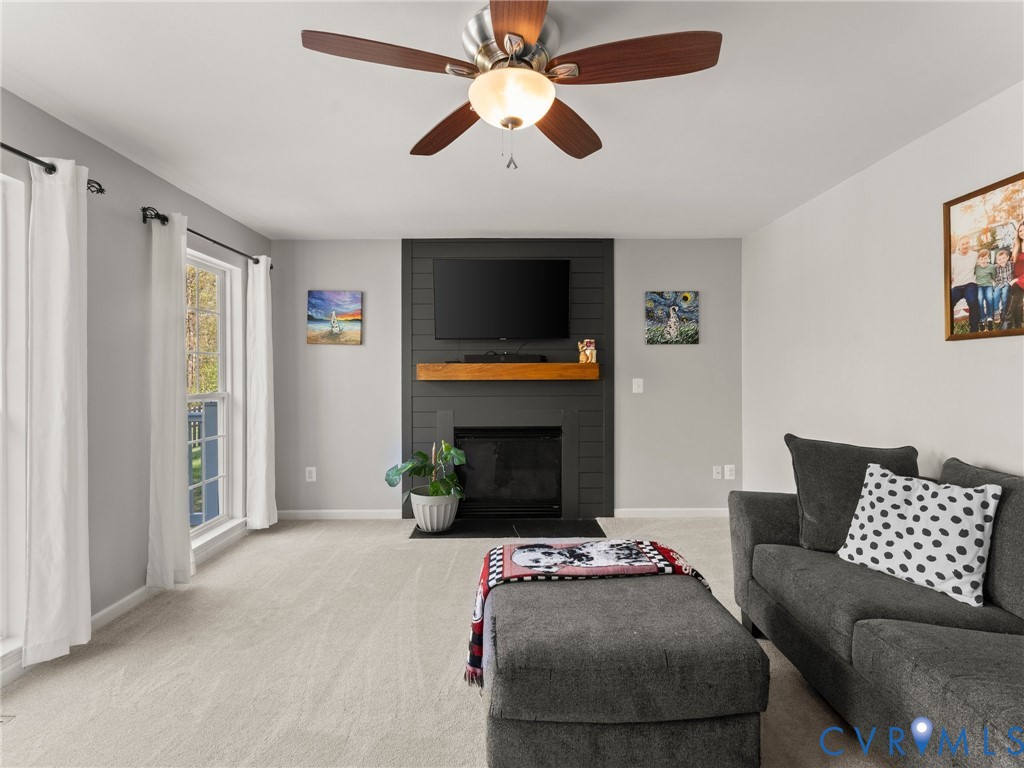 126 Reedy Creek Road Louisa, VA 23093 - Photo 17 of 65 Living room featuring light-colored carpeting, a c