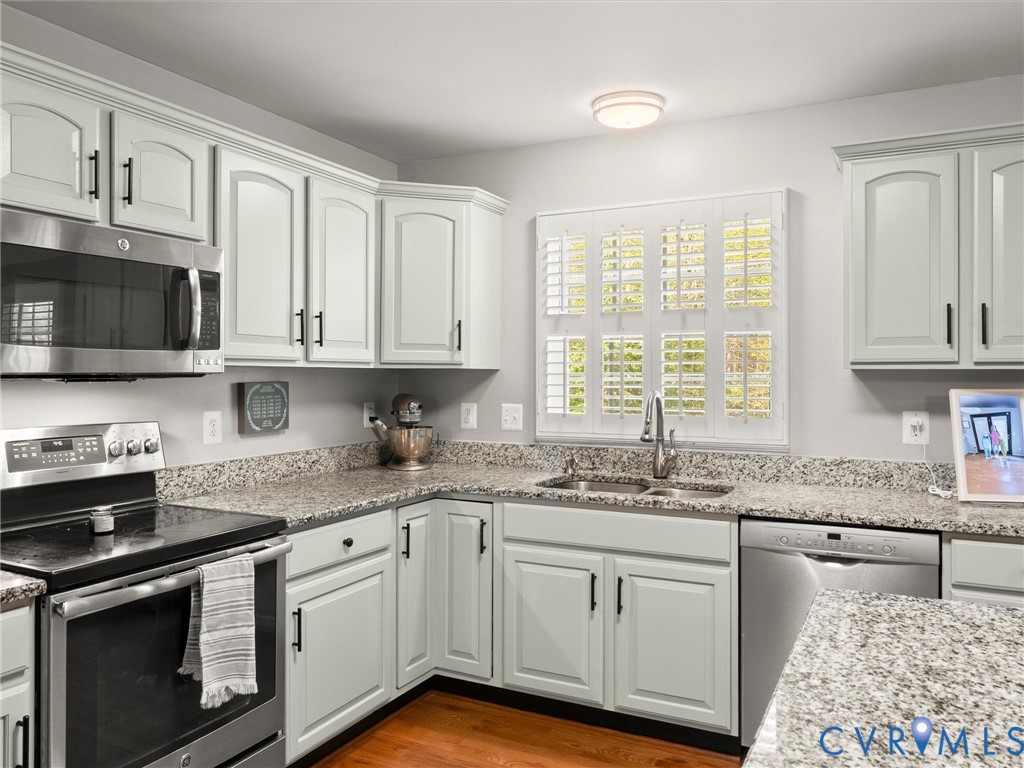 126 Reedy Creek Road Louisa, VA 23093 - Photo 23 of 65 The kitchen features light-colored cabinetry with