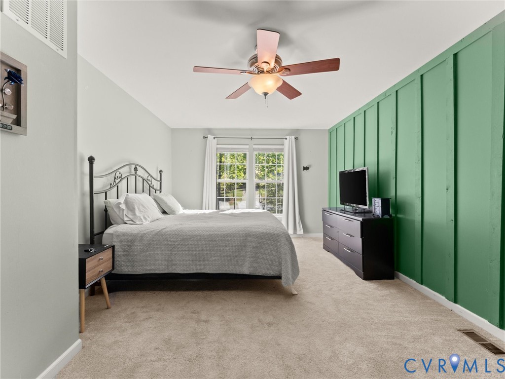 126 Reedy Creek Road Louisa, VA 23093 - Photo 36 of 65 The bedroom features carpeted flooring, a vaulted