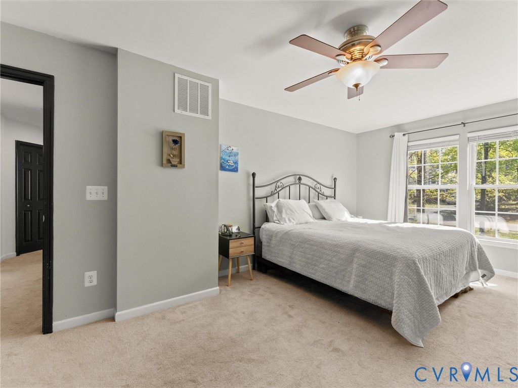 126 Reedy Creek Road Louisa, VA 23093 - Photo 39 of 65 This room features a ceiling fan, light gray walls