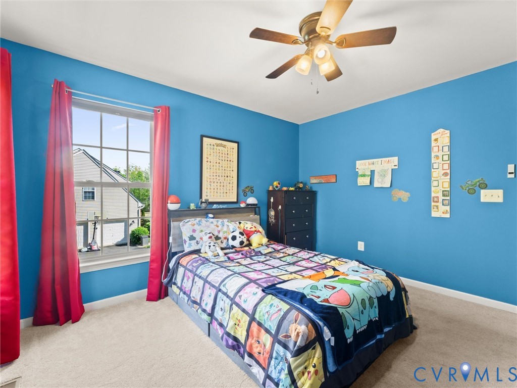 126 Reedy Creek Road Louisa, VA 23093 - Photo 47 of 65 This bedroom features a window providing natural l