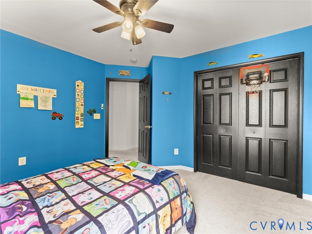 126 Reedy Creek Road Louisa, VA 23093 - Photo 48 of 65 This room features bright blue walls, light-colore