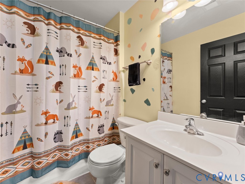 126 Reedy Creek Road Louisa, VA 23093 - Photo 49 of 65 This bathroom features a vanity with a white sink