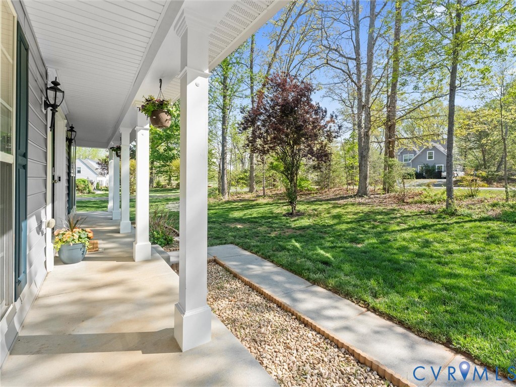 126 Reedy Creek Road Louisa, VA 23093 - Photo 5 of 65 The property features a charming front porch with