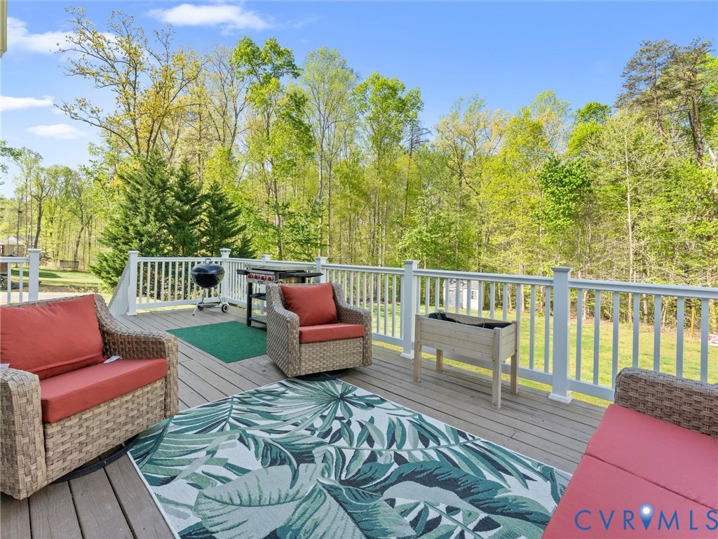 126 Reedy Creek Road Louisa, VA 23093 - Photo 57 of 65 The property features an outdoor deck with a white