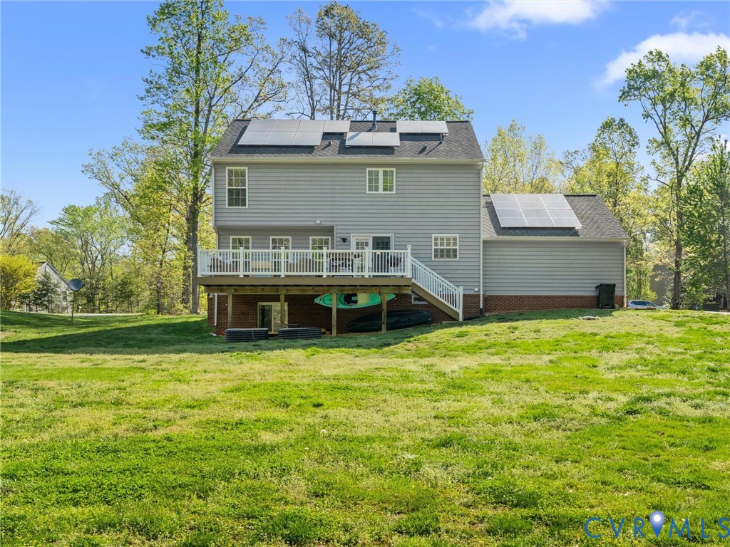 126 Reedy Creek Road Louisa, VA 23093 - Photo 59 of 65 The property features a large grassy yard with mat