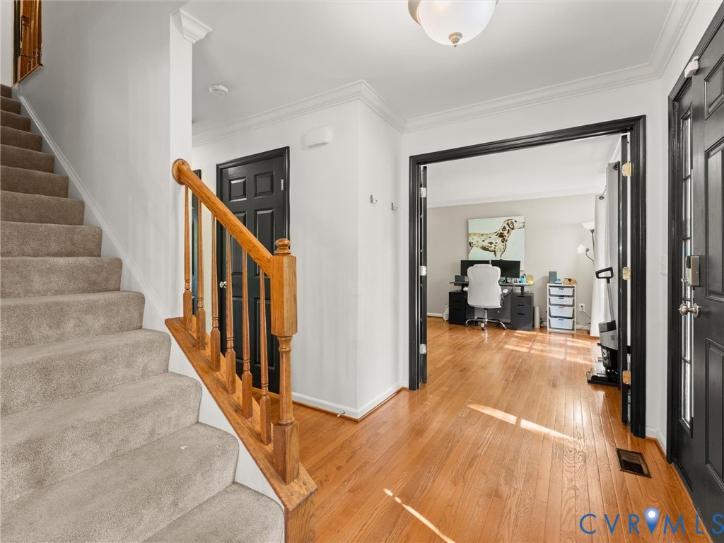 126 Reedy Creek Road Louisa, VA 23093 - Photo 7 of 65 The property features hardwood flooring in the ent
