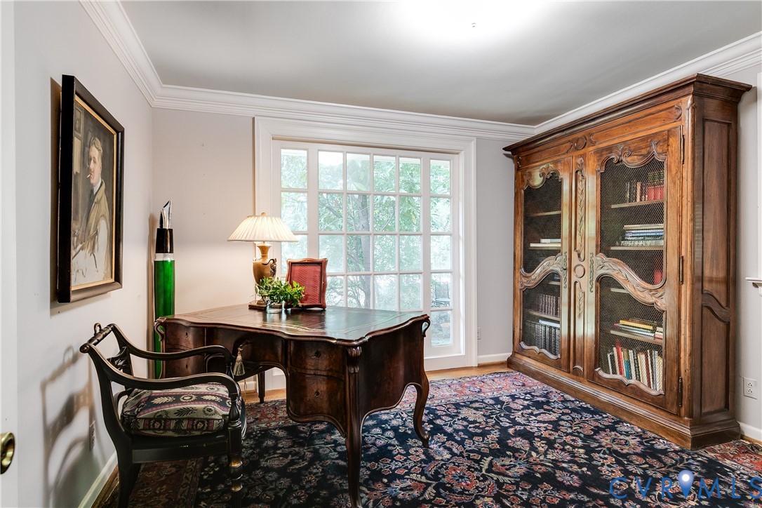 10475 Cherokee Road Richmond, VA 23235 - Photo 34 of 74 Room with crown molding, light gray walls, and lar