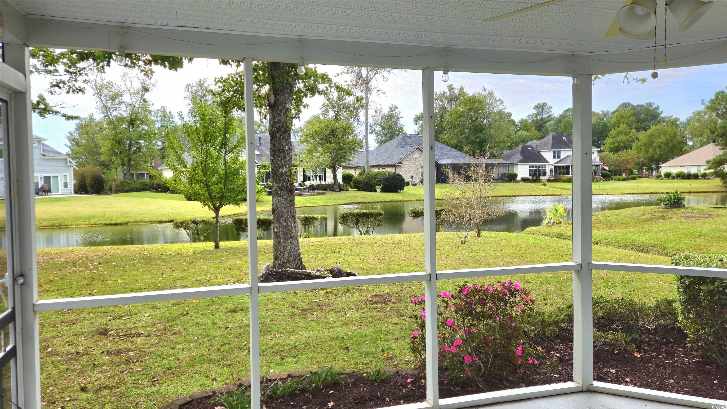 545 Saluda River Road Myrtle Beach, SC 29588 - Photo 13 of 25 Unfurnished sunroom with a water view