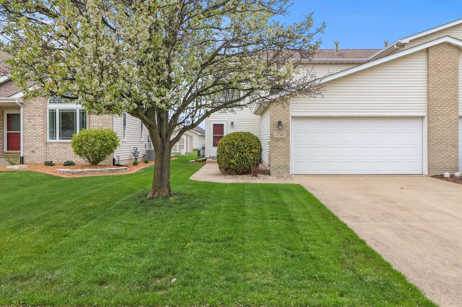 1710 Beech Drive Crown Point, IN 46307 - Photo 1 of 1 a front view of a house with garden