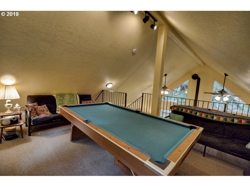 28260 Road 12, Unit LOT35 Rhododendron, OR 97049 - Photo 21 of 30 a view of a room with gym equipment