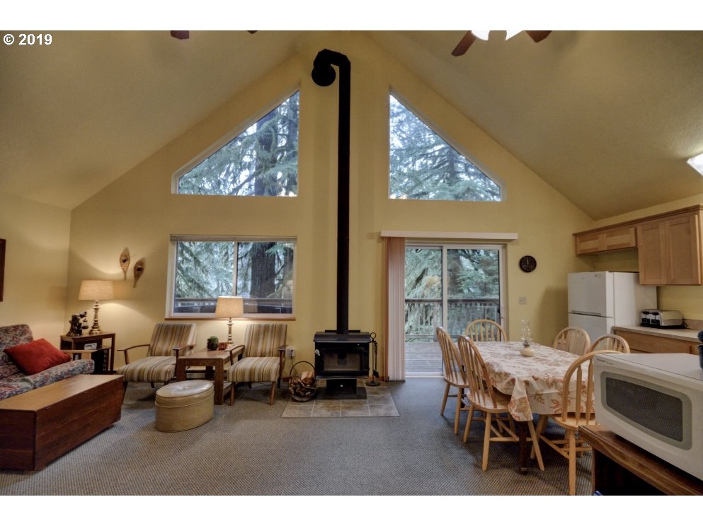 28260 Road 12, Unit LOT35 Rhododendron, OR 97049 - Photo 7 of 30 a living room with furniture and a large window