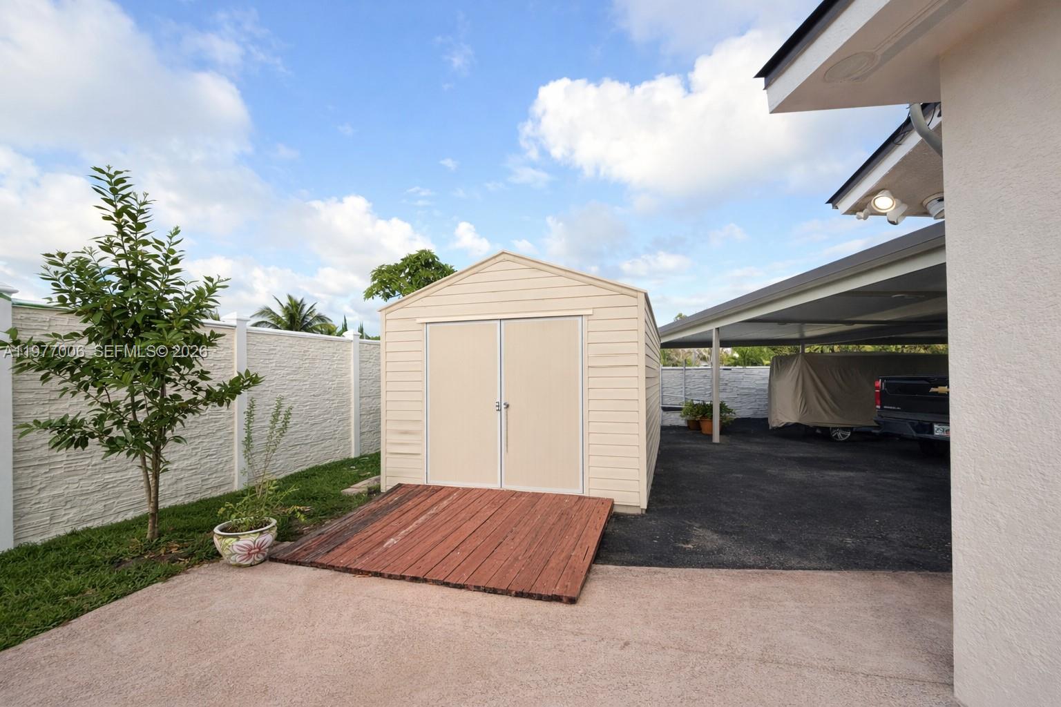 12901 Southwest 191st Street Miami, FL 33177 - Photo 21 of 27 a view of a outdoor space