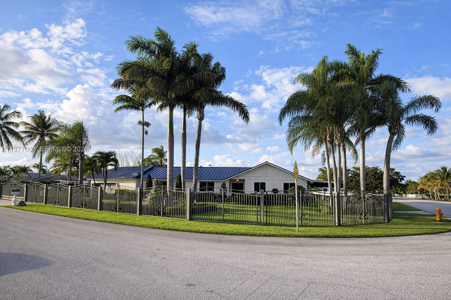 12901 Southwest 191st Street Miami, FL 33177 - Photo 26 of 27 a view of a park with palm trees