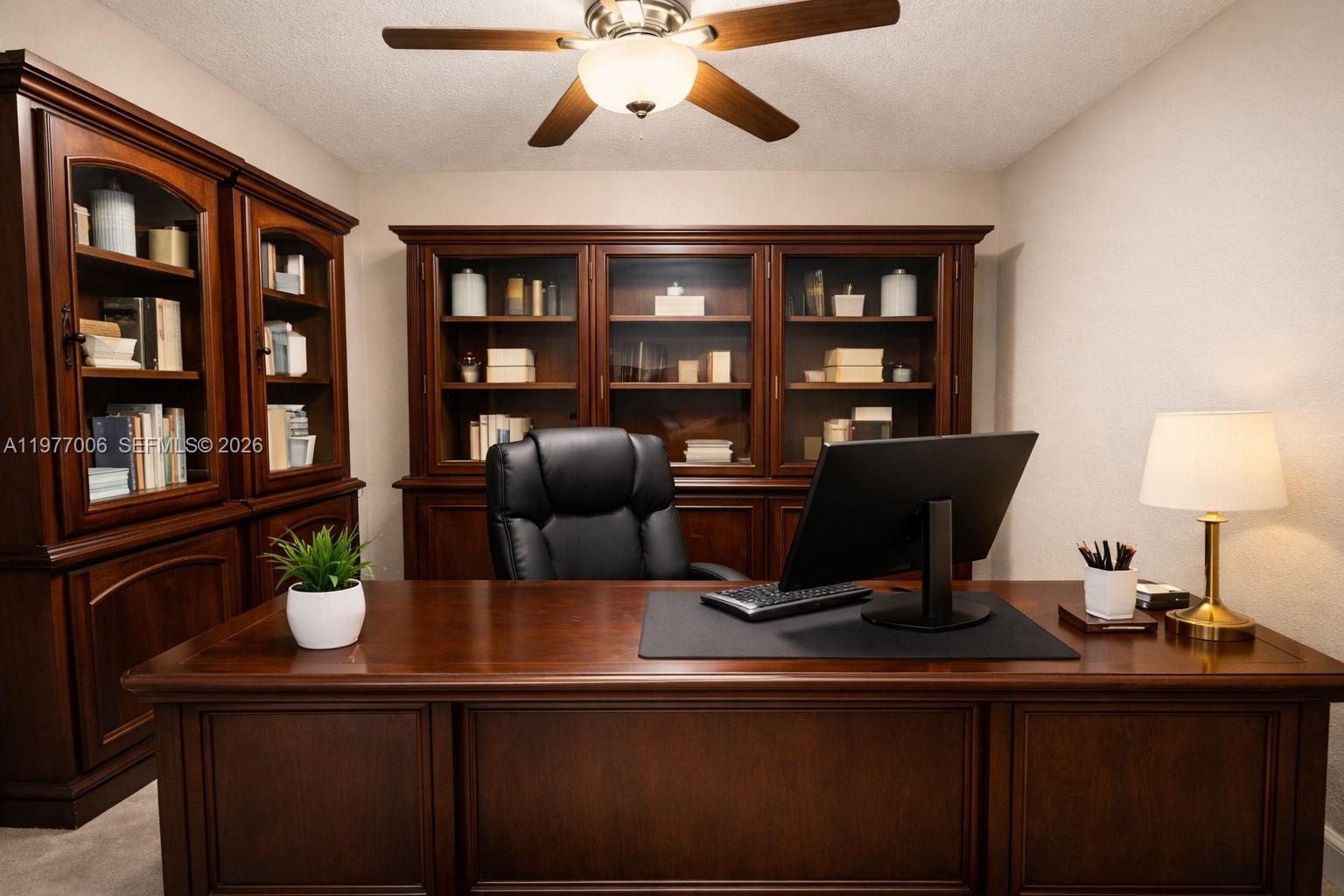 12901 Southwest 191st Street Miami, FL 33177 - Photo 9 of 27 a view of a workspace with furniture