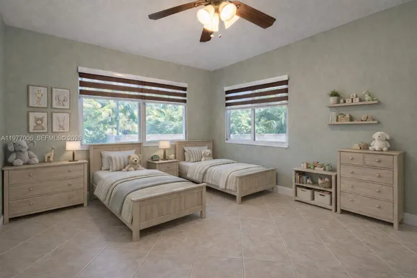 a spacious bedroom with a bed and a window