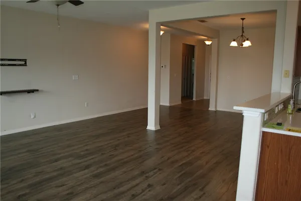 a view of a livingroom with wooden floor