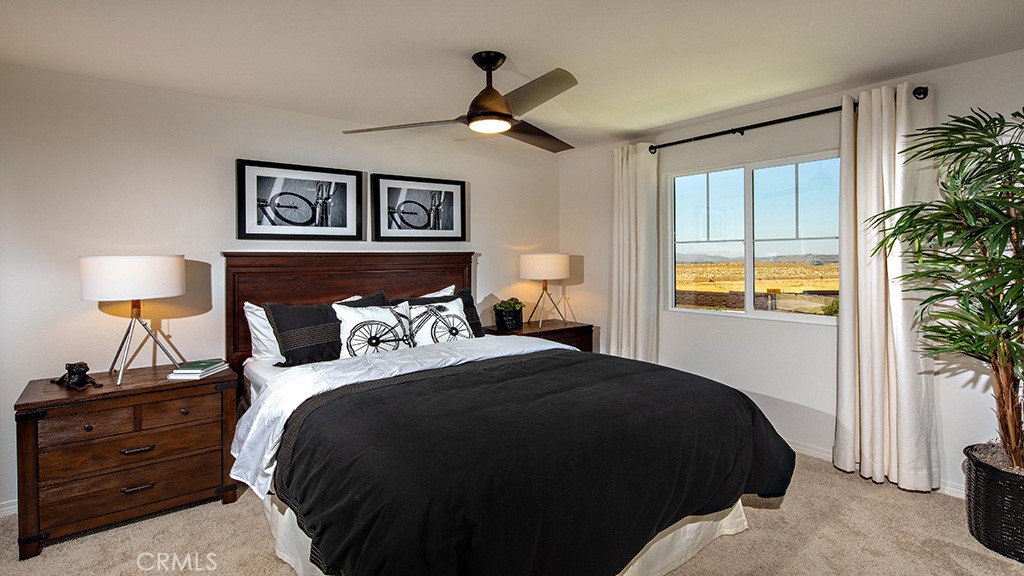 14068 Hera Place Beaumont, CA 92223 - Photo 11 of 14 a bedroom with a bed and a window